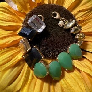 J Crew gold tone green, gray and clear rhinestone bracelet.